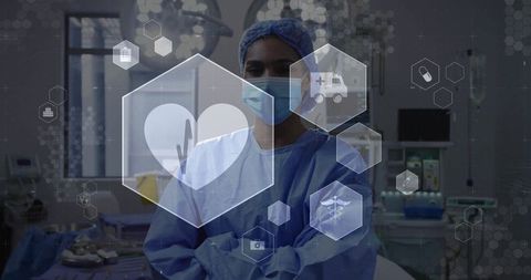 Surgeon standing in or wearing surgical gown mask crossing arms with medical ui