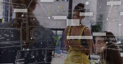 Woman Presenting at Collaborative Tech Meeting with Futuristic Data HUD Overlay