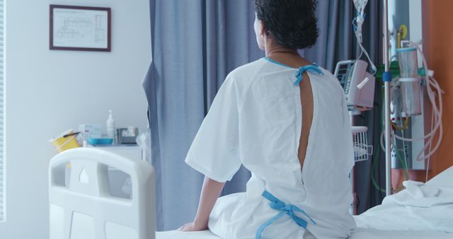 Patient in Hospital Room Sitting on Bed - Download Free Stock Images Pikwizard.com