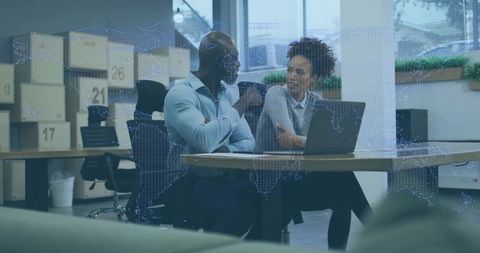 Business Team Collaborating at Office Desk with Digital Overlay