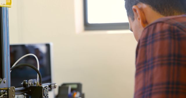 Engineer Operating 3D Printer in Modern Workspace - Download Free Stock Images Pikwizard.com