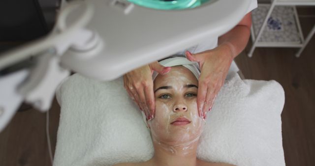 Caucasian Woman Enjoying Facial Treatment at Beauty Salon - Download Free Stock Images Pikwizard.com