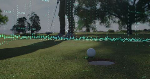 Golfer Analyzing Shot with Technological Data Overlay on Green