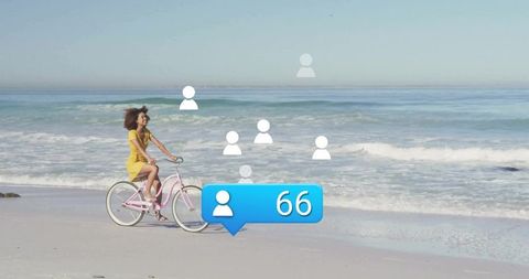 Woman Cycling on Beach with Virtual Social Media Interactions