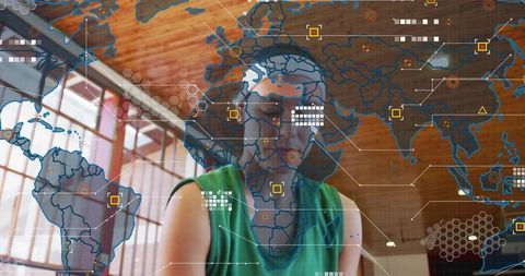 Female athlete wearing green tank top training with augmented reality map overlay in modern gym