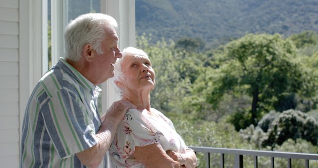 Elderly Couple Enjoying Relaxing Time on Balcony with Scenic View - Download Free Stock Images Pikwizard.com