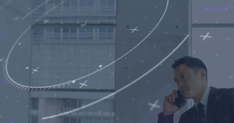 Businessman Using Smartphone by Windows with Futuristic Digital Overlay