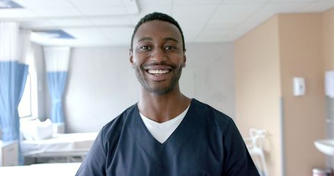 Smiling African American Doctor in Hospital Ward