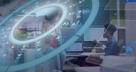 Coworkers Collaborating with Augmented Reality Data Overlay in Modern Office