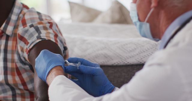 Doctor Administering Vaccine to Patient in Home Setting - Download Free Stock Images Pikwizard.com