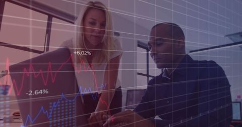 Office Professionals Analyzing Data with Digital Charts Overlay