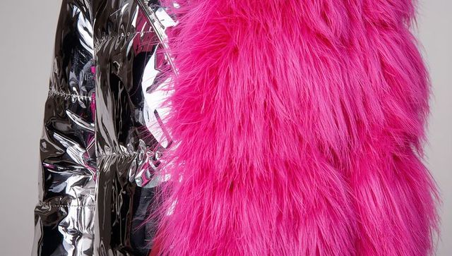 Hot pink faux fur coat contrasting shiny silver metallic jacket bold texture close-up