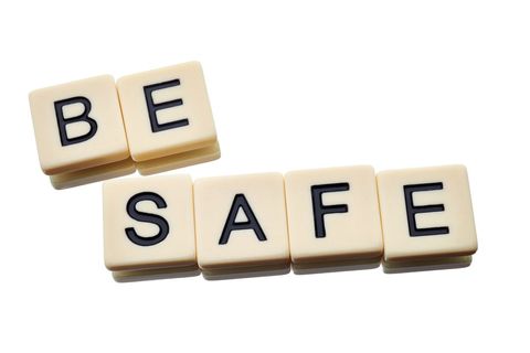 Be safe letter tiles on white background