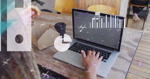 Business Professional Working on Data Analysis with Overlaid Graphics