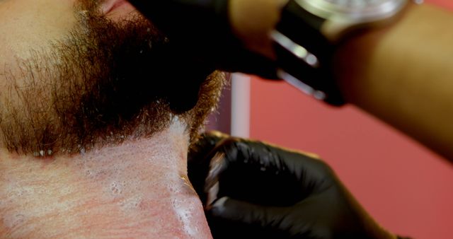Close-up of Man Receiving Beard Trim at Barber Shop - Download Free Stock Images Pikwizard.com