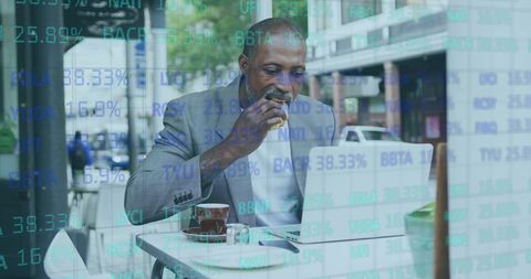 Senior Man Analyzing Stock Market Data on Laptop