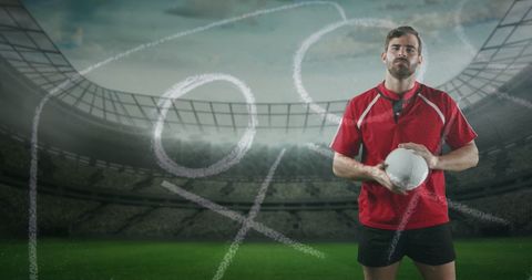Rugby Player Strategizing with Game Plan in Stadium
