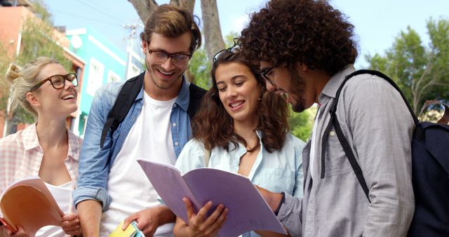 Diverse Group of Smiling Students Studying Together Outdoors - Download Free Stock Images Pikwizard.com