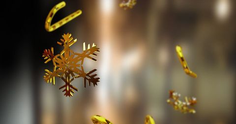 Floating Gold Snowflakes and Candy Canes on Grey Background