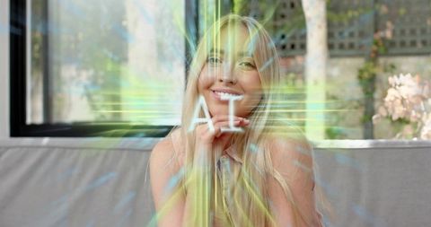 Young woman smiling on sofa with holographic ai overlay, futuristic home tech lifestyle