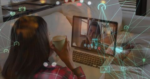 Virtual connection: woman enjoys video call on laptop