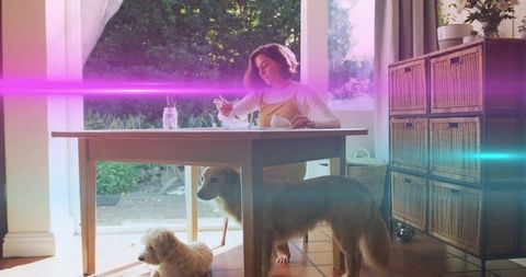 Artist Sketching at Table with Pets in Cozy Rustic Home Setting