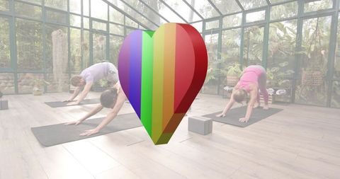 Sunlit conservatory yoga trio practicing downward dog and stretching, rainbow heart wellness