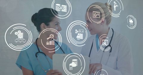 Female doctors discussing digital health solutions