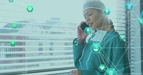 Nurse Communicating on Smartphone with Digital Interface