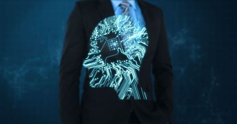 Businessman with Digital Circuit Overlay Symbolizing AI Innovation