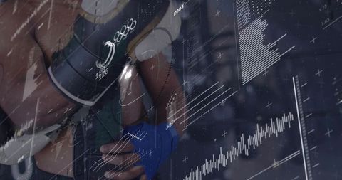 Gripping boxer training on heavy bag with analytics hud overlaying performance data