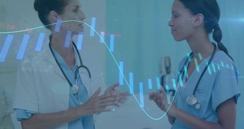 Clinicians discussing with digital health analytics overlay teamwork and patient monitoring