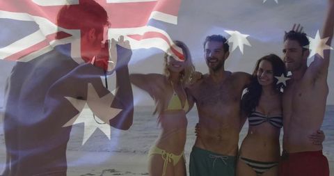 Friends Enjoying Australian Beach with National Flag Overlay