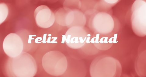 Feliz Navidad Greeting on Festive Red Bokeh Background - Download Free Stock Images Pikwizard.com