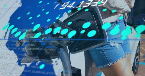 Woman charging electric vehicle with digital data overlay