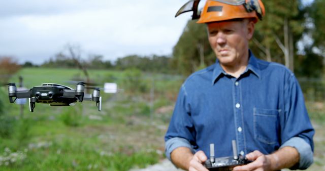 Lumberjack operating drone in forest at countryside 4k