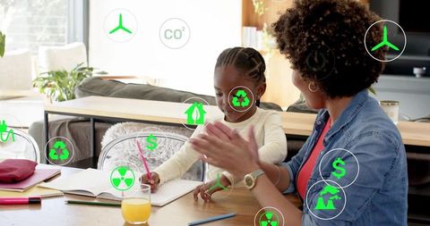 Parent teaching child sustainable living at home with green energy and recycling icons