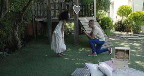 Romantic garden proposal with love and surprise