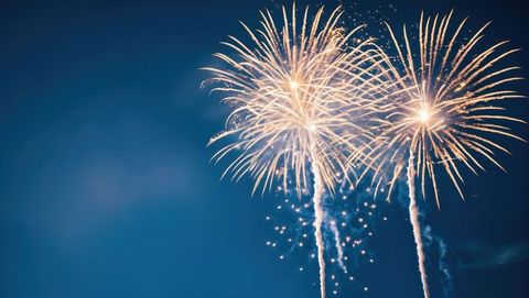 Golden Fireworks Bursting in Night Sky
