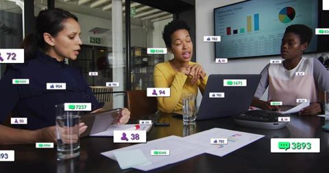Team presenting with laptop and social media engagement overlays in modern conference room