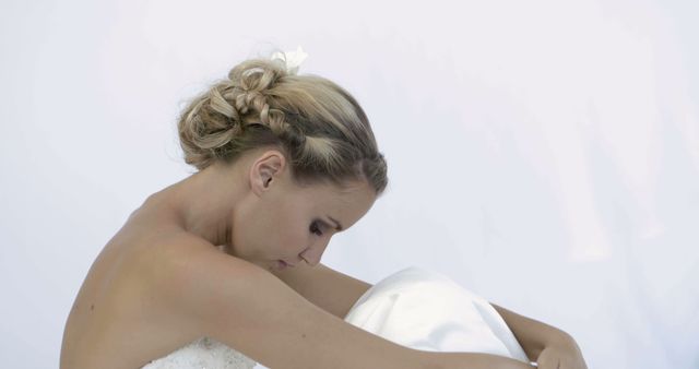 Elegant Bride Sitting in Contemplation with Wedding Dress - Download Free Stock Images Pikwizard.com