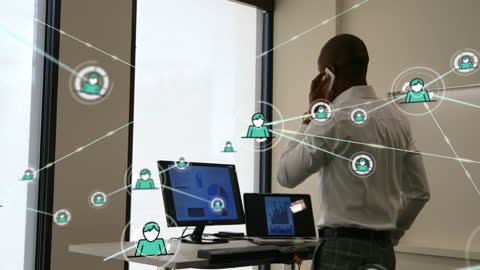 Businessman Utilizes Technology with Networking Icons Overlay