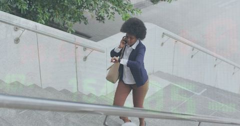 Businesswoman Multitasking Checking Time While Walking
