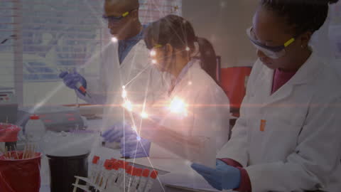 Diverse Scientists Discussing Research in Modern Laboratory