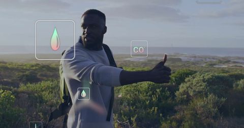 Man Analyses Environmental Data with Technology While Hiking - Download Free Stock Images Pikwizard.com