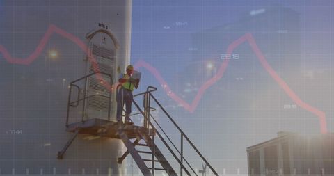 Engineer Working on Wind Turbine Overlayed with Financial Analytics