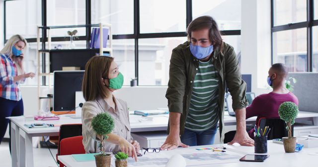 Coworkers Collaborating in Modern Office While Wearing Face Masks - Download Free Stock Images Pikwizard.com