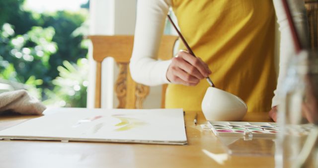 Woman Painting with Watercolors at Home - Download Free Stock Images Pikwizard.com