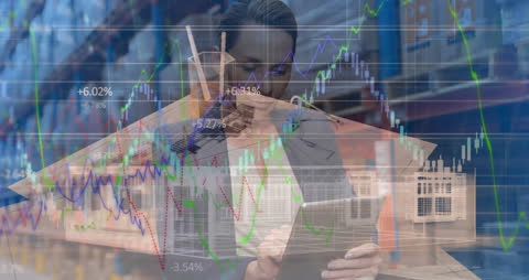 Warehouse Worker Analyzing Financial Data with Overlaid Graphs