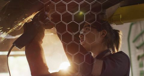 Female Mechanic Working on Vehicle with Digital Overlay